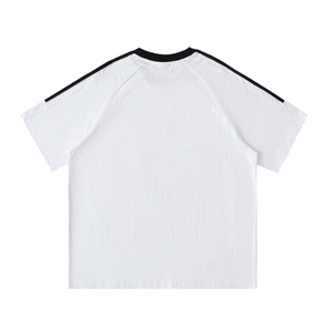 White t-shirt with black trim on a white background