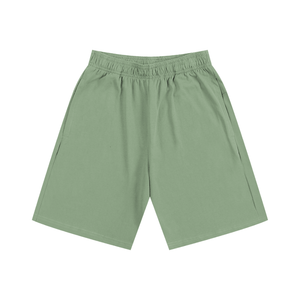 Green shorts on a white background