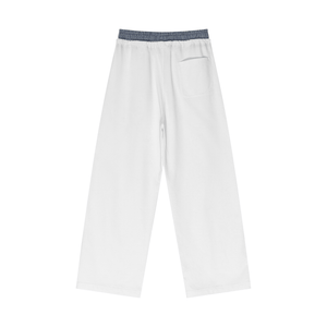 White pants with a blue waistband on a white background
