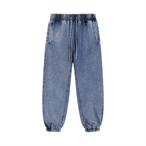 Light blue denim jogger pants on a white background