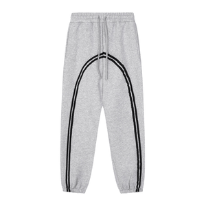 Gray sweatpants with black stripes on a white background