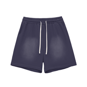 Gray shorts with a white drawstring on a white background