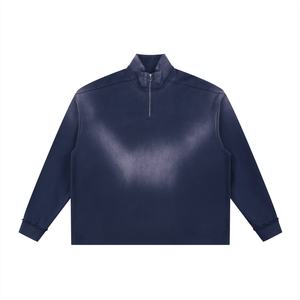 Navy blue pullover with a quarter zip on a white background