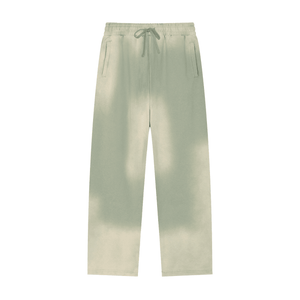 Light green pants with a drawstring on a white background