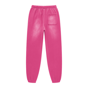 Pink sweatpants on a white background
