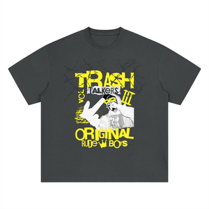 A dark gray crewneck t-shirt featuring a bold yellow and white graphic print on the front with the text 'TRASH TALKERS III ORIGINAL RUDS W BOYS' and a hand gesture illustration.