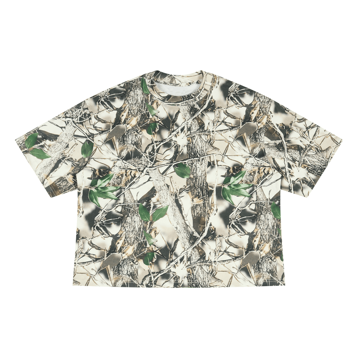 A short-sleeve crewneck t-shirt featuring a realistic woodland camouflage pattern with tree bark, branches, leaves, and grass in shades of beige, brown, green, and gray, laid flat against a white background.