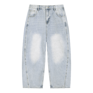 Light blue denim jeans with slight distressing on a white background