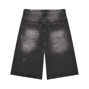 Black denim shorts on a white background