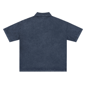 Back view of a blue denim shirt on a white background